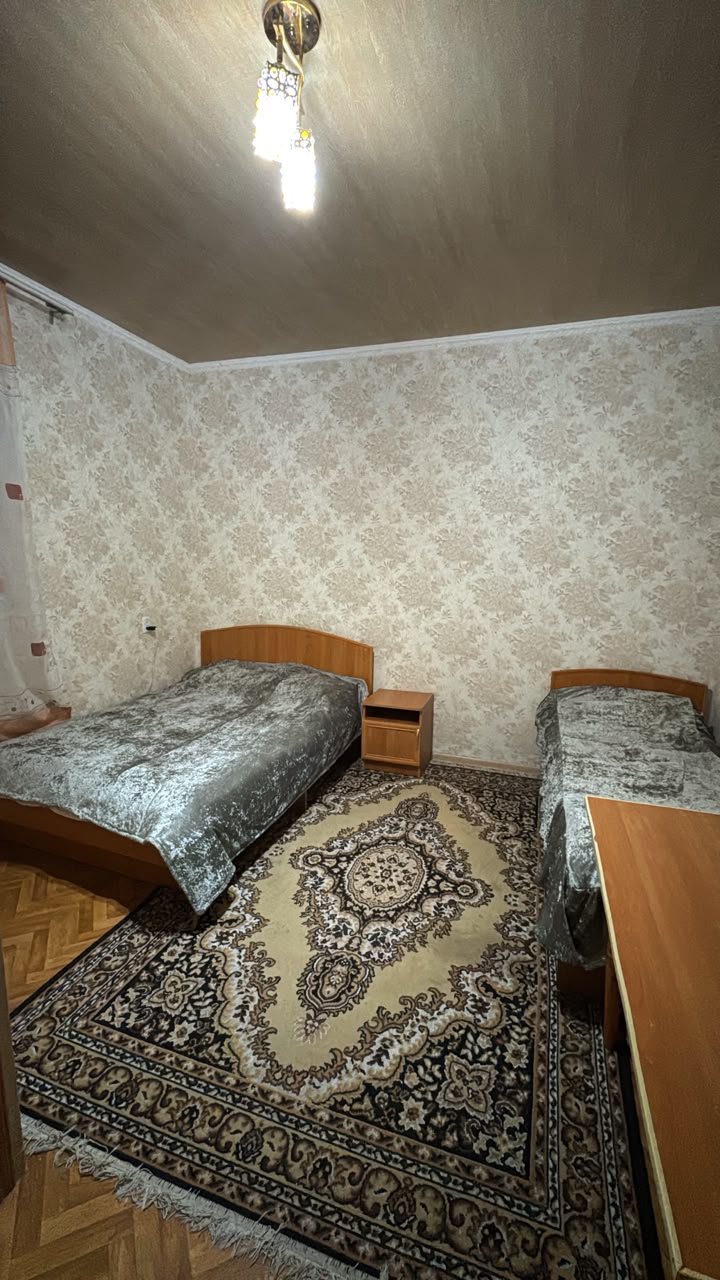Семейный номер с двумя отдельными кроватями в гостевом доме Айколь